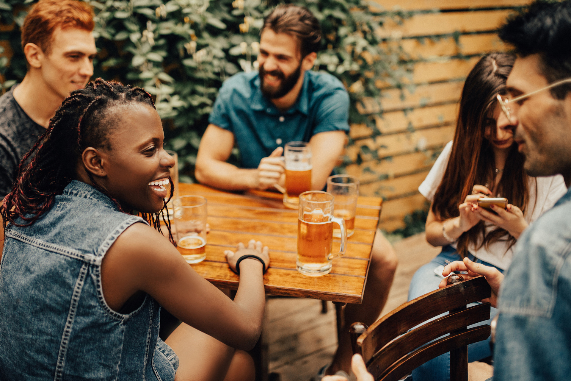 Happy friends having a great time at the pub