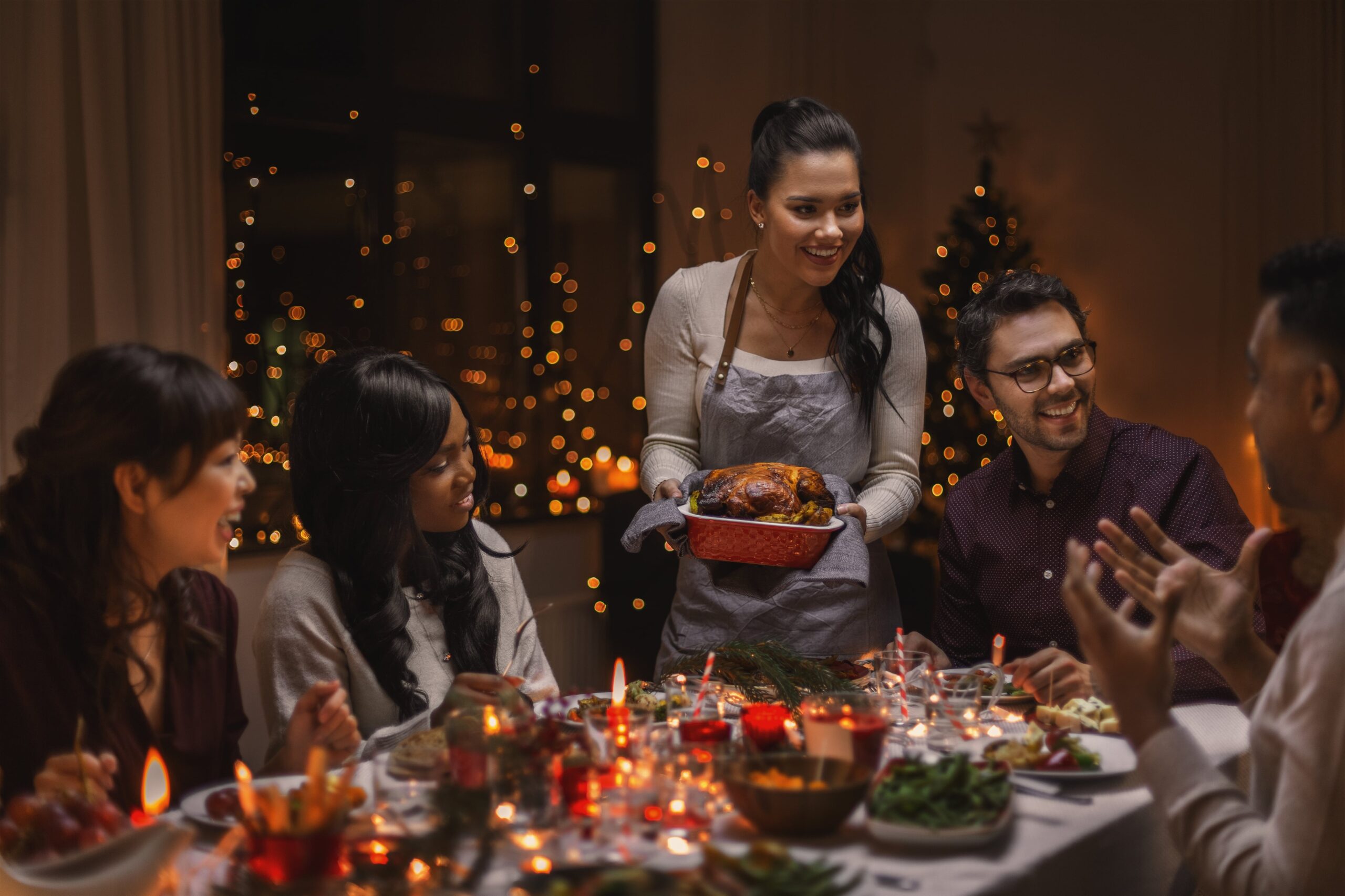 group of friends having turkey dinner-min