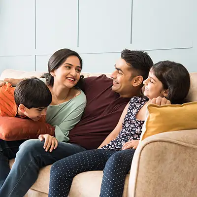 Happy Cultural Family on Couch